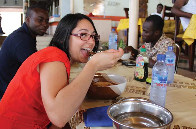 Picture of Farah eating in Ghana