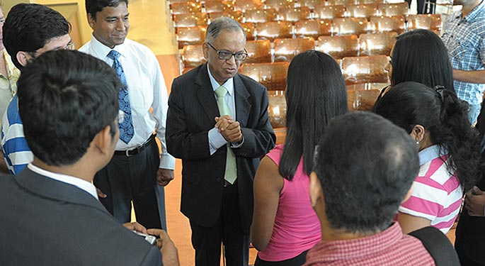 N. R. Narayana Murthy speaks with a group of students.