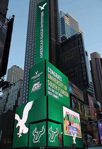 Large signs in Times Square congratulating the USF men's golf team on their Big East championship.